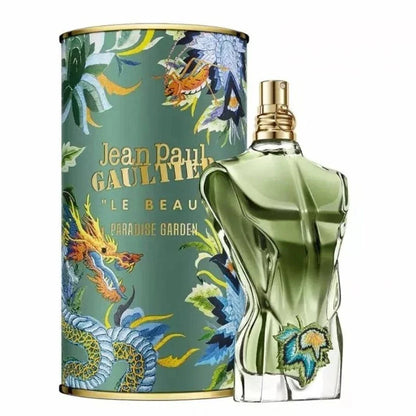 Jean Paul Gaultier perfume bottle and packaging with floral and dragon design.